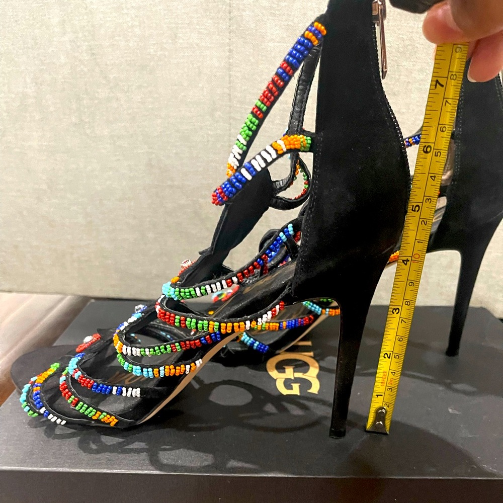 Never worn multi color heels, great for a evening out!!